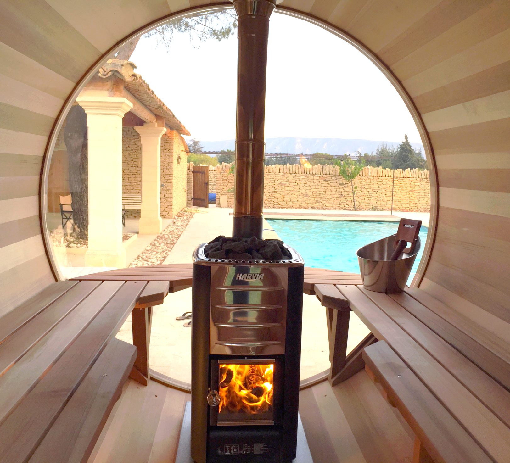 Wood-heated scenic view sauna by the pool